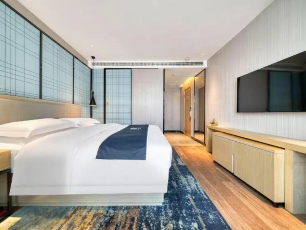 Bed in Echarm Hotel Chengdu Global Center Century City New Exhibition