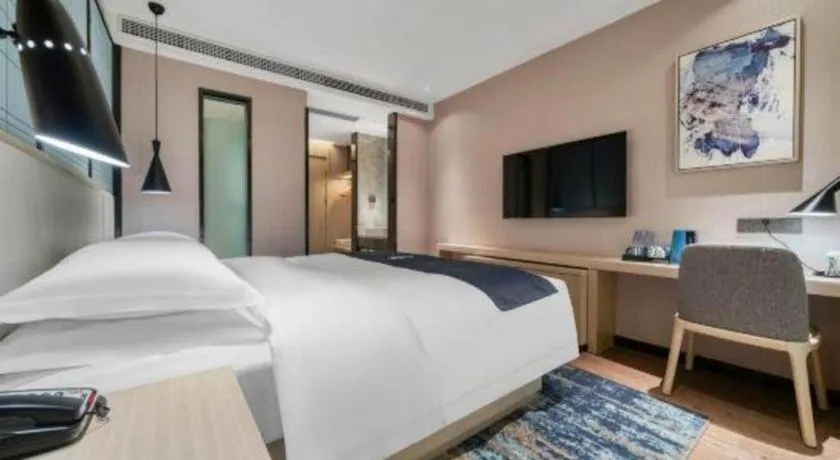 Bed in Echarm Hotel Chengdu Global Center Century City New Exhibition