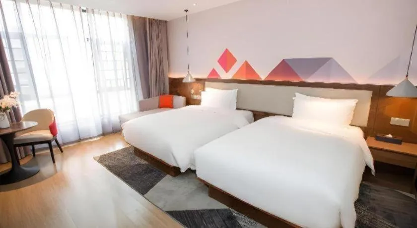 Bed in Borrman Hotel Baise High-speed Railway Station Hengning Plaza