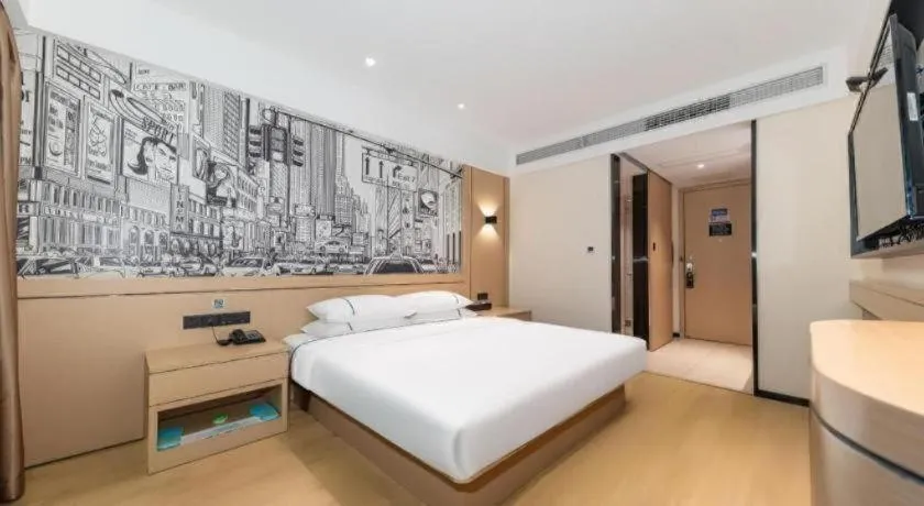 Bed in City Comfort Inn Jingzhou Fantawild Shashi Middle School