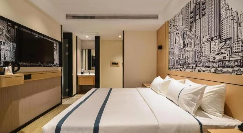 Bed in City Comfort Inn Jingzhou Fantawild Shashi Middle School