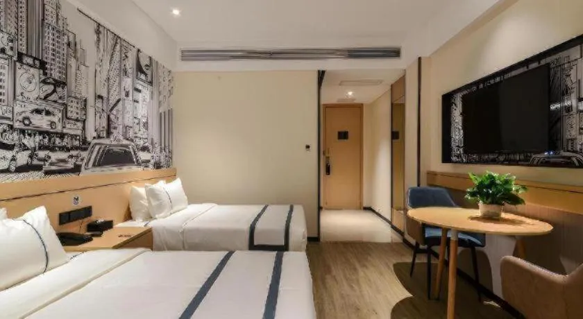 Bed in City Comfort Inn Jingzhou Fantawild Shashi Middle School