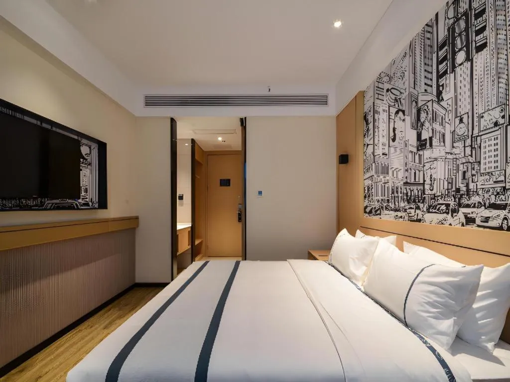 Bed in City Comfort Inn Jingzhou Fantawild Shashi Middle School