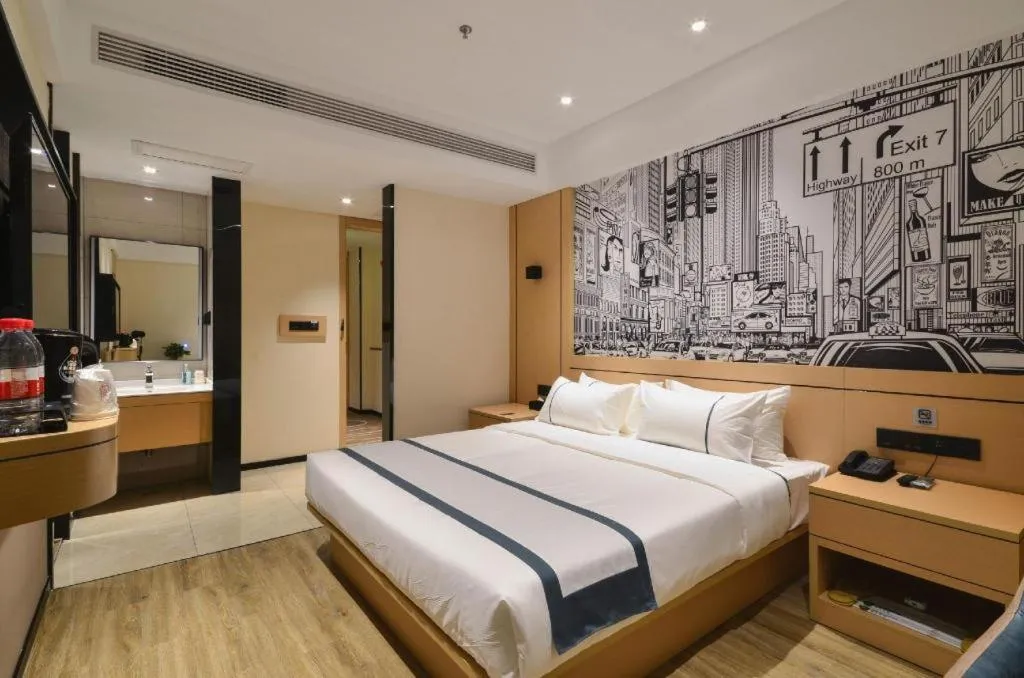 Bed in City Comfort Inn Jingzhou Fantawild Shashi Middle School