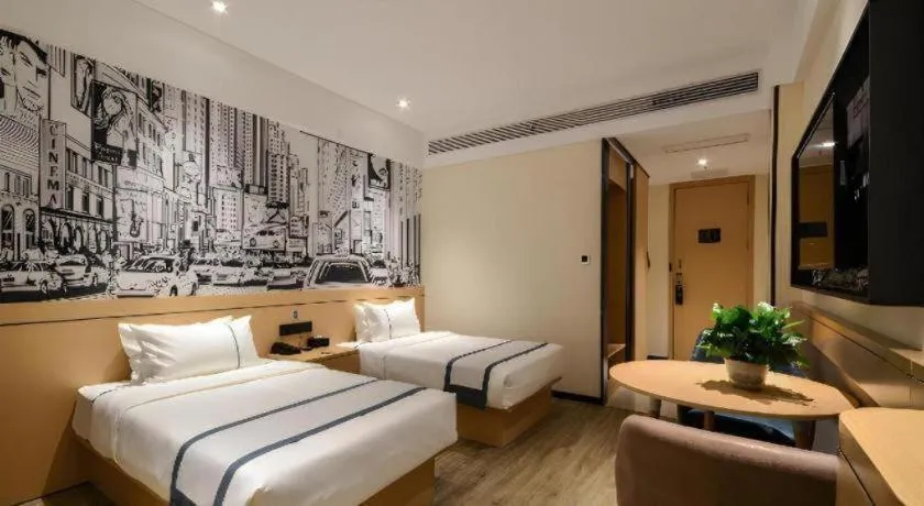 Bed in City Comfort Inn Jingzhou Fantawild Shashi Middle School