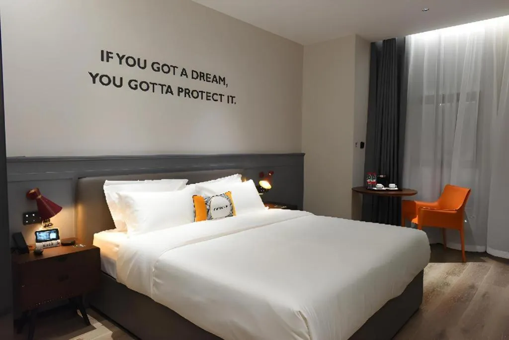 Bed in Premier City Comfort Hotel Hechi Luocheng Central Plaza