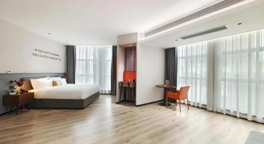 Bed in Premier City Comfort Hotel Hechi Luocheng Central Plaza