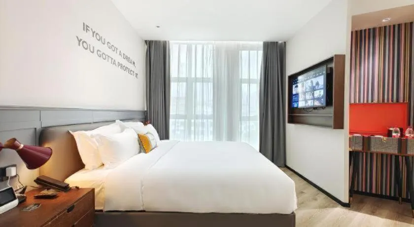 Bed in Premier City Comfort Hotel Hechi Luocheng Central Plaza