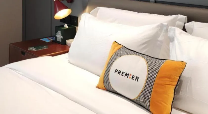 Bed in Premier City Comfort Hotel Hechi Luocheng Central Plaza