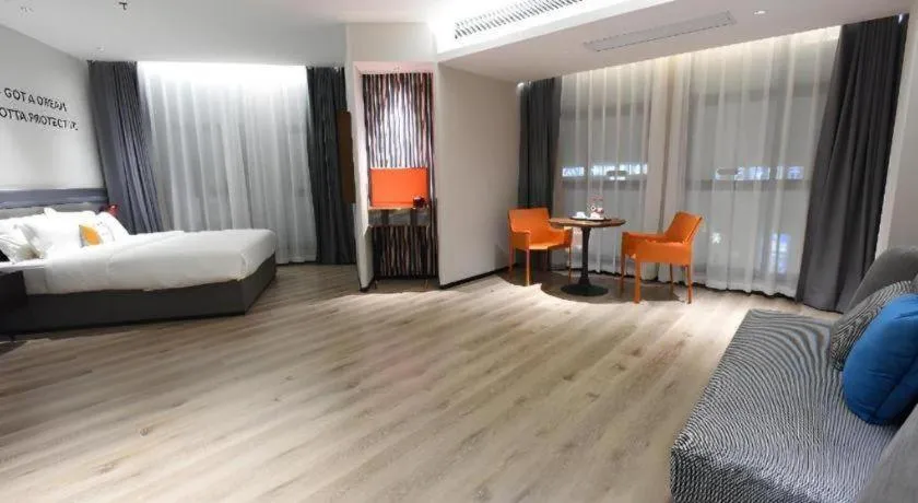 Bed in Premier City Comfort Hotel Hechi Luocheng Central Plaza