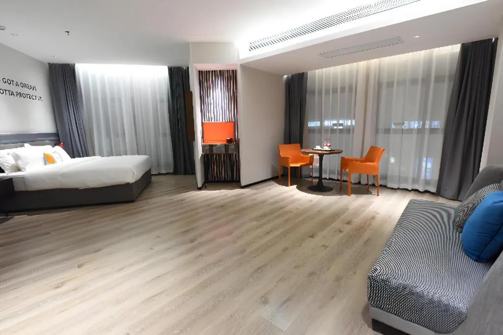 Bed in Premier City Comfort Hotel Hechi Luocheng Central Plaza