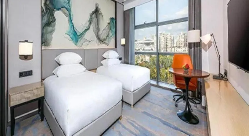 Bed in New Century Grand Hotel Ningbo Zhongdu