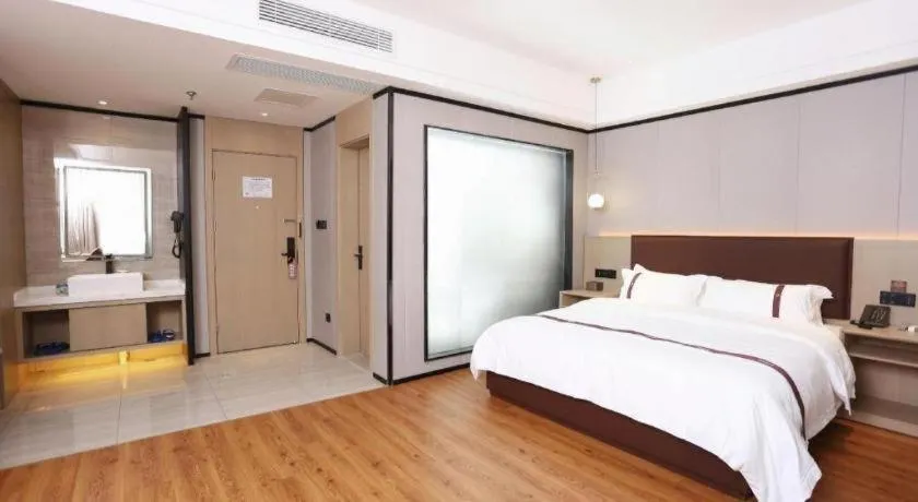 Bed in Gya Hotel Beijing Shunyi Yanjing Bridge