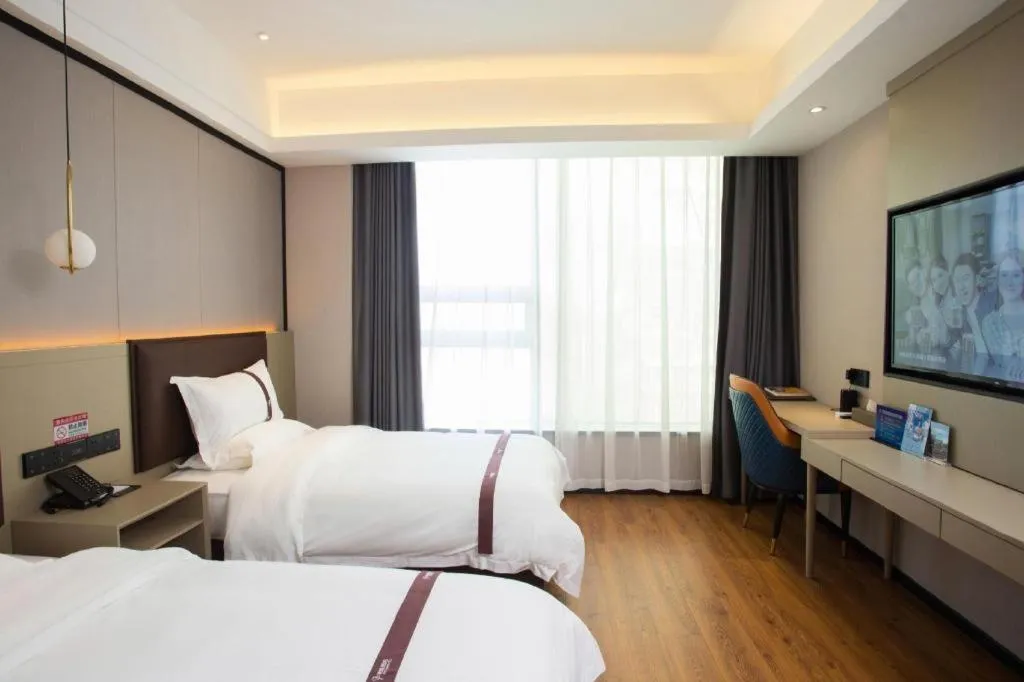 Bed in Gya Hotel Beijing Shunyi Yanjing Bridge
