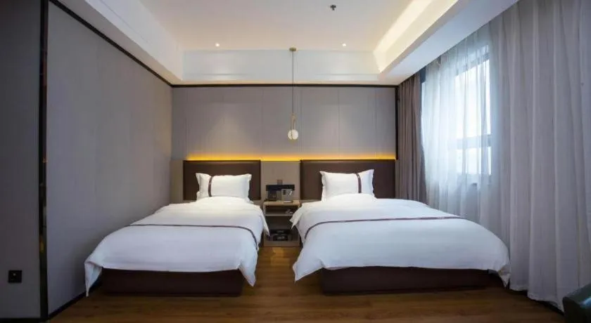 Bed in Gya Hotel Beijing Shunyi Yanjing Bridge