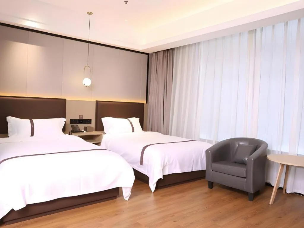 Bed in Gya Hotel Beijing Shunyi Yanjing Bridge