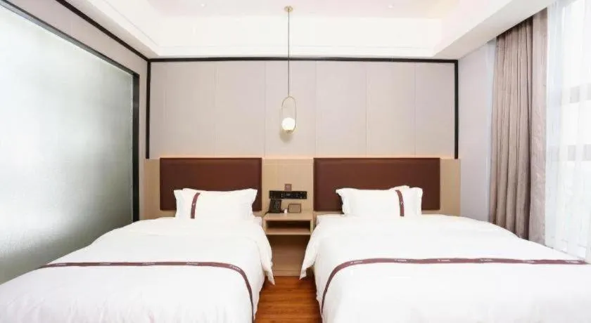 Bed in Gya Hotel Beijing Shunyi Yanjing Bridge