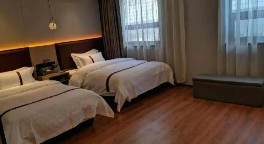 Bed in Gya Hotel Beijing Shunyi Yanjing Bridge