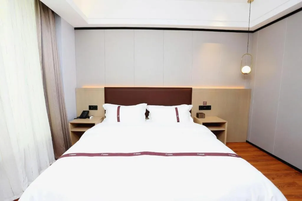 Bed in Gya Hotel Beijing Shunyi Yanjing Bridge