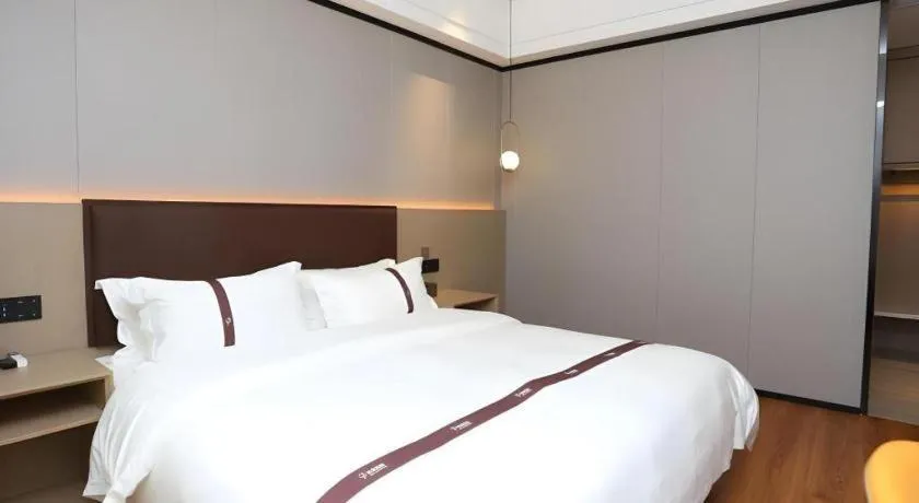 Bed in Gya Hotel Beijing Shunyi Yanjing Bridge