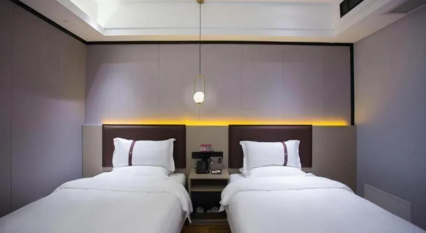 Bed in Gya Hotel Beijing Shunyi Yanjing Bridge