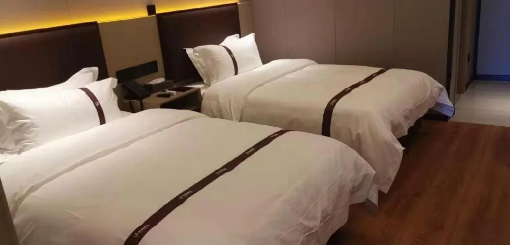 Bed in Gya Hotel Beijing Shunyi Yanjing Bridge