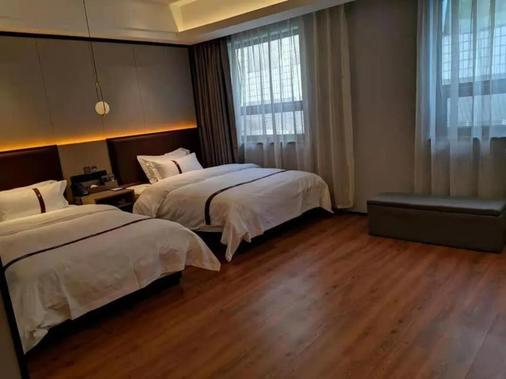 Bed in Gya Hotel Beijing Shunyi Yanjing Bridge