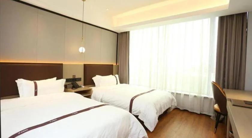Bed in Gya Hotel Beijing Shunyi Yanjing Bridge