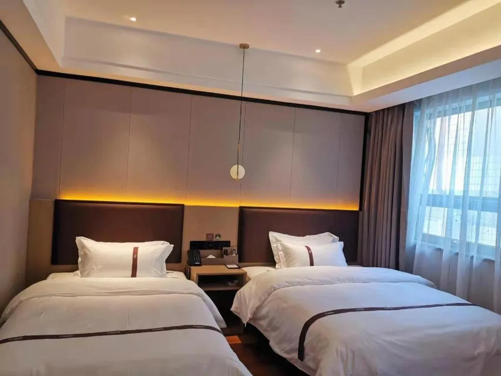 Bed in Gya Hotel Beijing Shunyi Yanjing Bridge