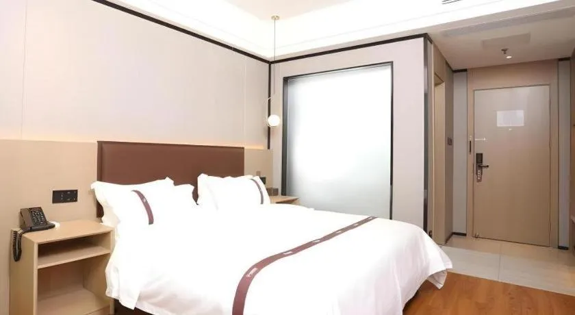 Bed in Gya Hotel Beijing Shunyi Yanjing Bridge