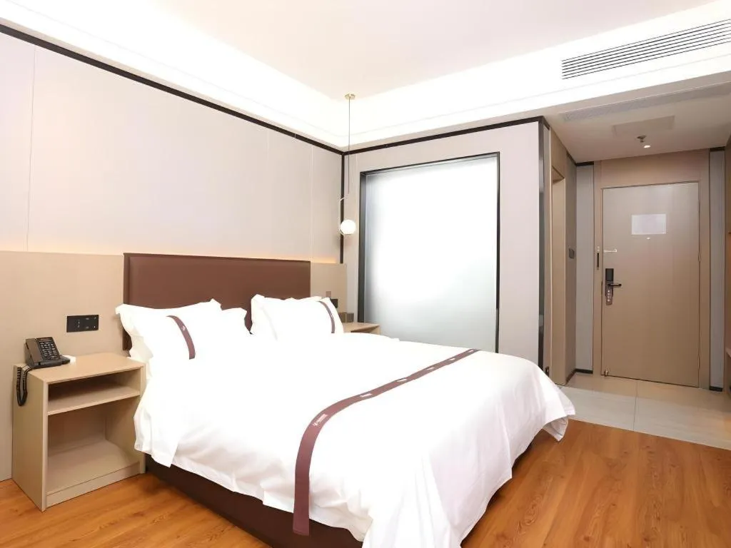 Bed in Gya Hotel Beijing Shunyi Yanjing Bridge