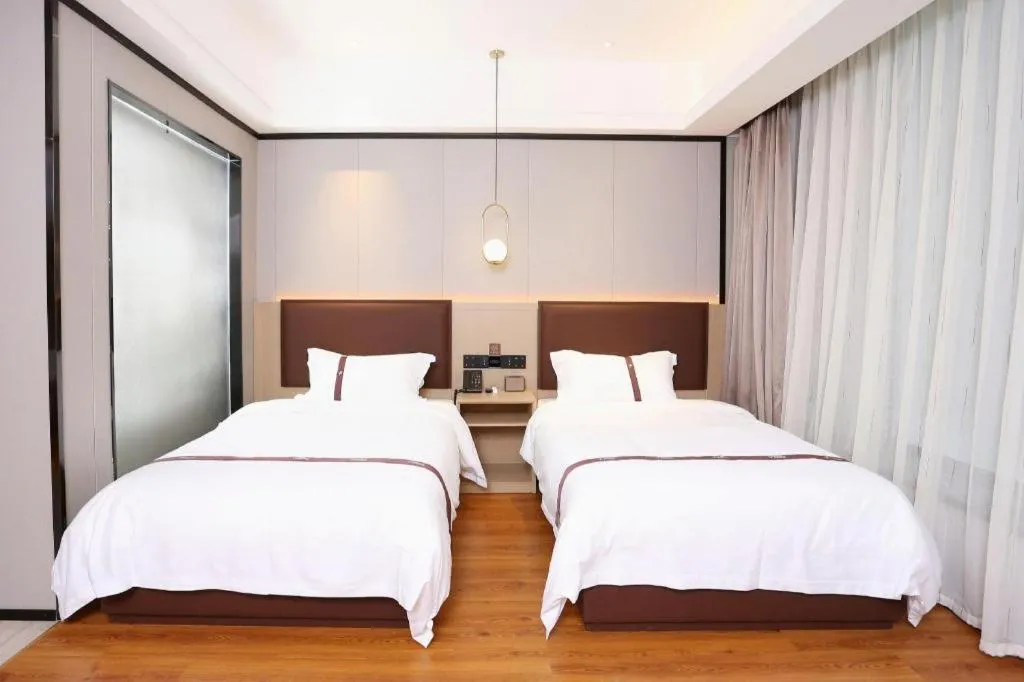 Bed in Gya Hotel Beijing Shunyi Yanjing Bridge