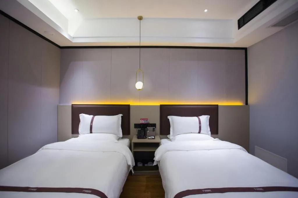 Bed in Gya Hotel Beijing Shunyi Yanjing Bridge