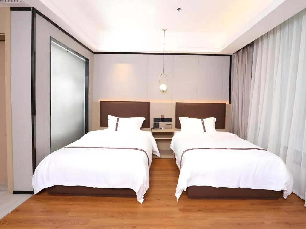 Bed in Gya Hotel Beijing Shunyi Yanjing Bridge