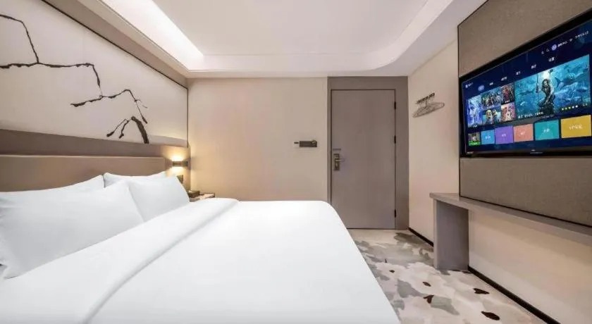 Bed in GreenTree Eastern Chongqing Yangjiaping Pedestrian Street Mixc Hotel