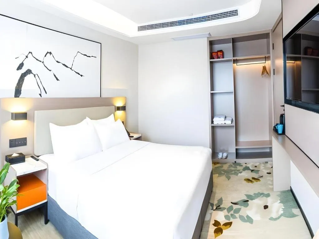 Bed in GreenTree Eastern Chongqing Yangjiaping Pedestrian Street Mixc Hotel