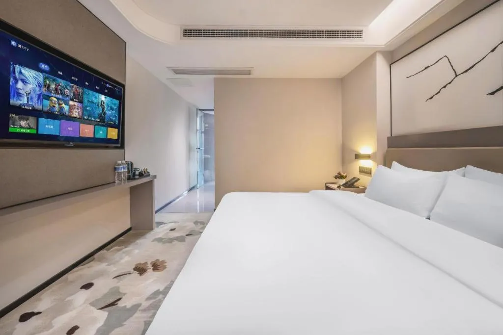 Bed in GreenTree Eastern Chongqing Yangjiaping Pedestrian Street Mixc Hotel