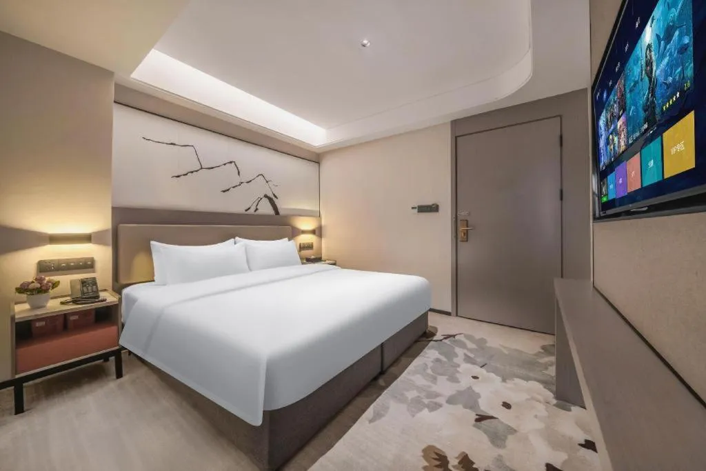 Bed in GreenTree Eastern Chongqing Yangjiaping Pedestrian Street Mixc Hotel