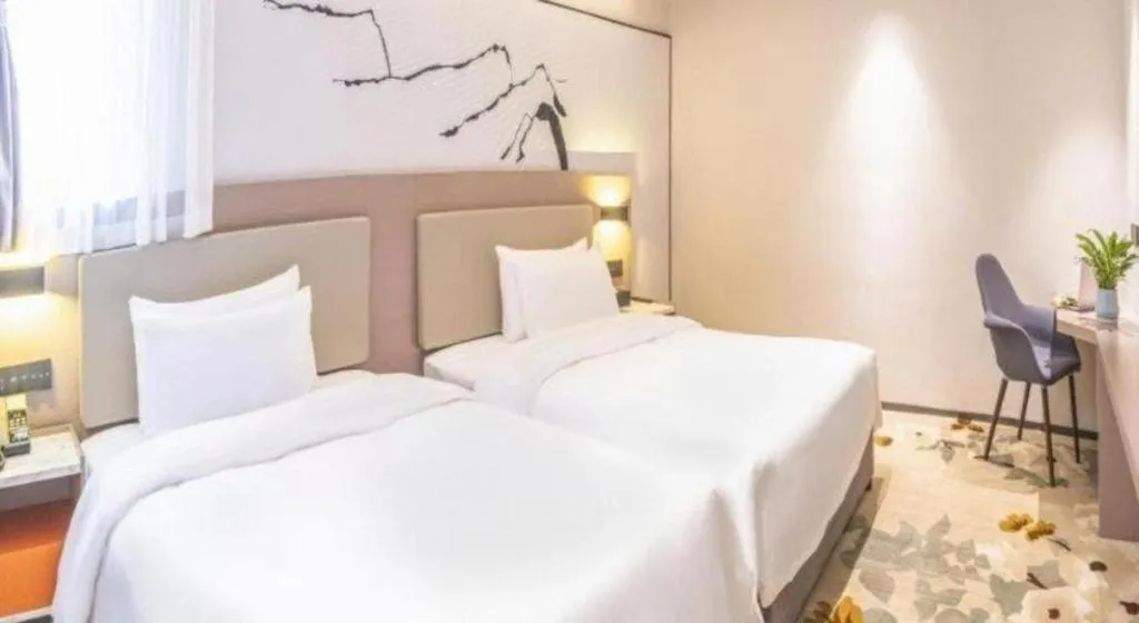 Bed in GreenTree Eastern Chongqing Yangjiaping Pedestrian Street Mixc Hotel