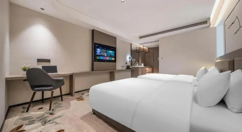 Bed in GreenTree Eastern Chongqing Yangjiaping Pedestrian Street Mixc Hotel
