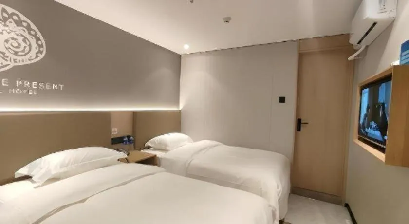 Bed in Shell Hotel Beijing Shunyi District Shunyi Metro Station
