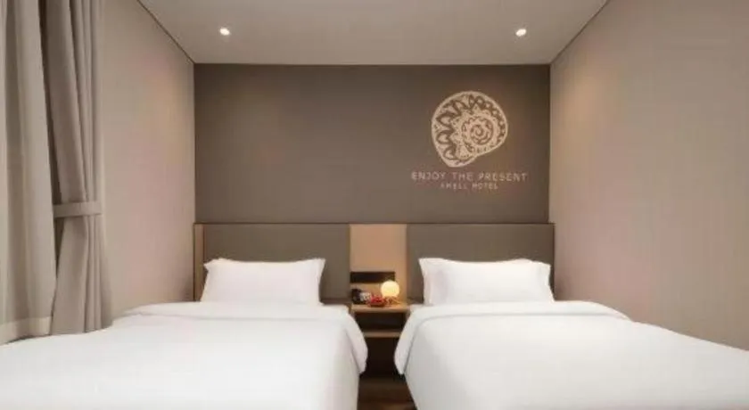 Bed in Shell Hotel Beijing Shunyi District Shunyi Metro Station