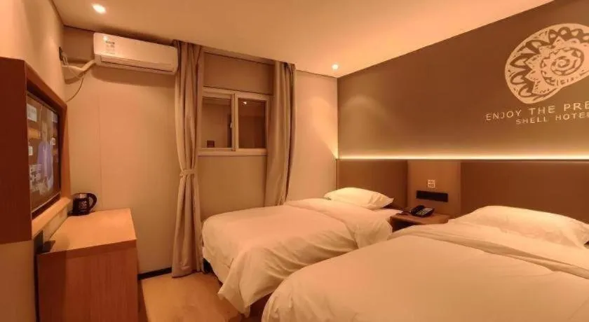 Bed in Shell Hotel Beijing Shunyi District Shunyi Metro Station