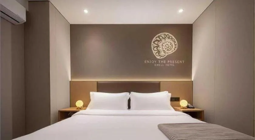 Bed in Shell Hotel Beijing Shunyi District Shunyi Metro Station