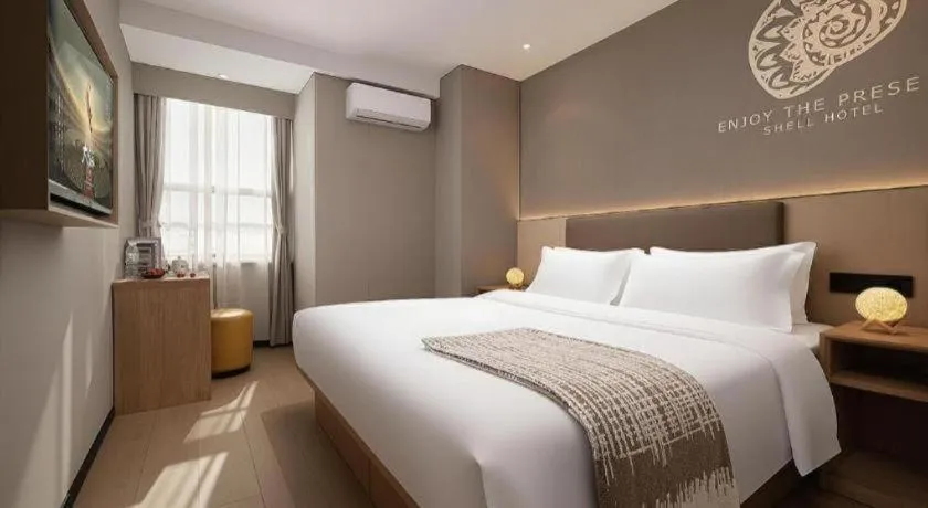 Bed in Shell Hotel Beijing Shunyi District Shunyi Metro Station