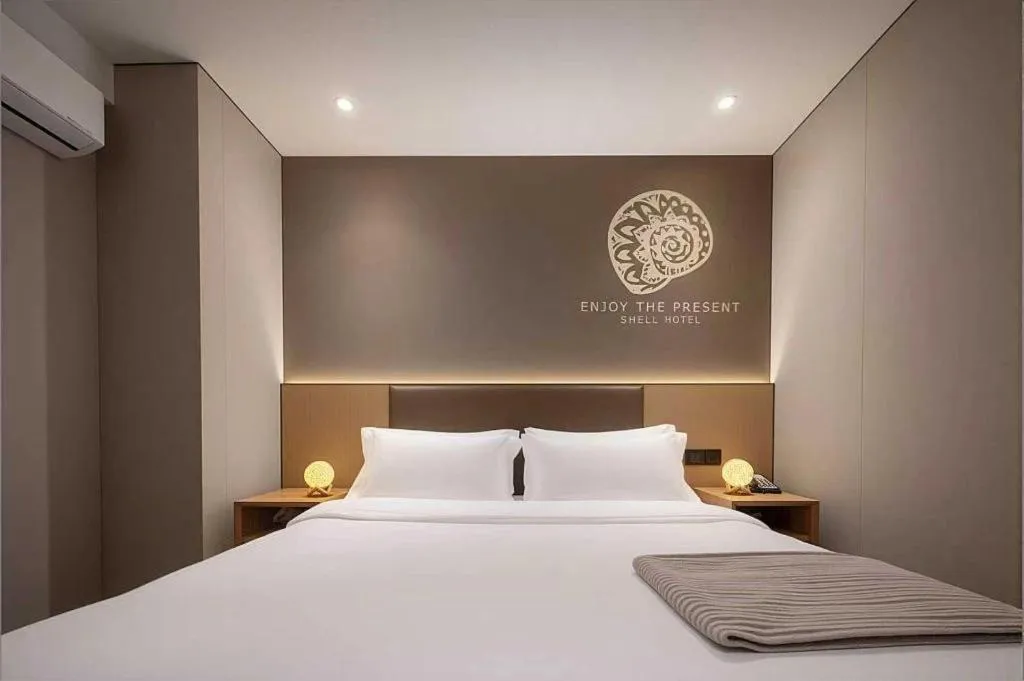 Bed in Shell Hotel Beijing Shunyi District Shunyi Metro Station