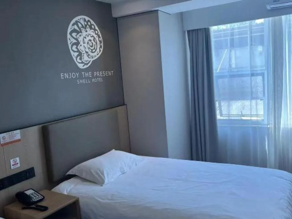 Bed in Shell Hotel Beijing Shunyi District Shunyi Metro Station
