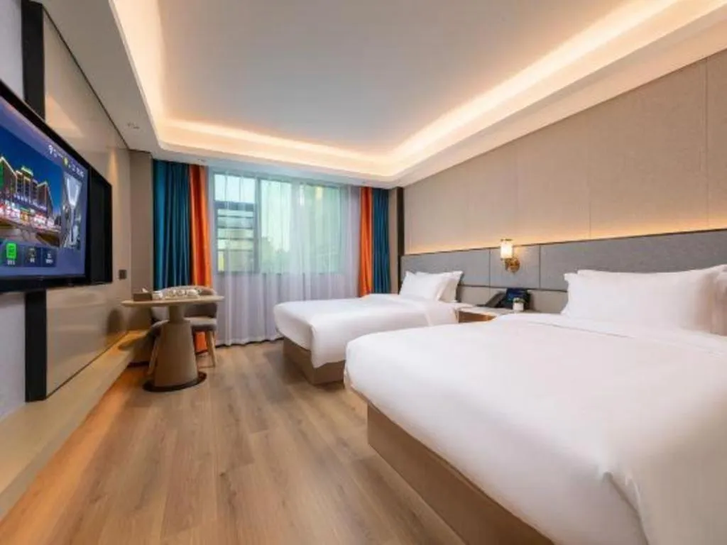 Bed in Gya Hotel Zhuhai International Airport New Town