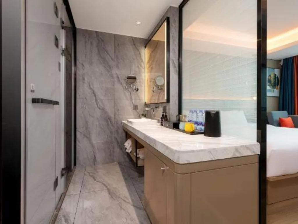 Bed in Gya Hotel Zhuhai International Airport New Town