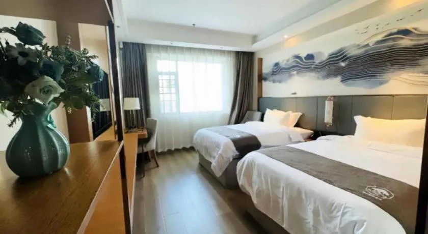 Bed in Gya Hotel Zhuhai International Airport New Town